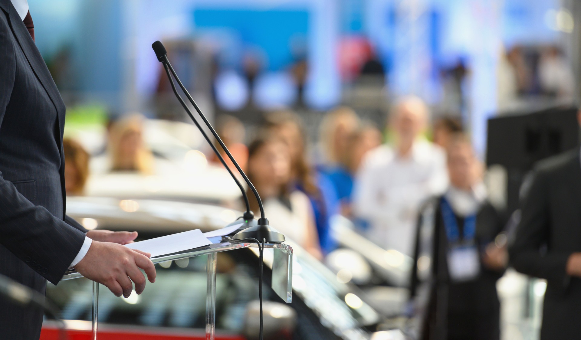 Politician speaking publicly from the lectern